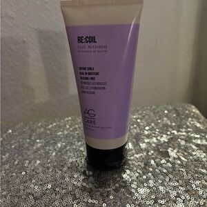 Ag Adriano Goldschmied Re:Coil Curl Activator in Purple and Black